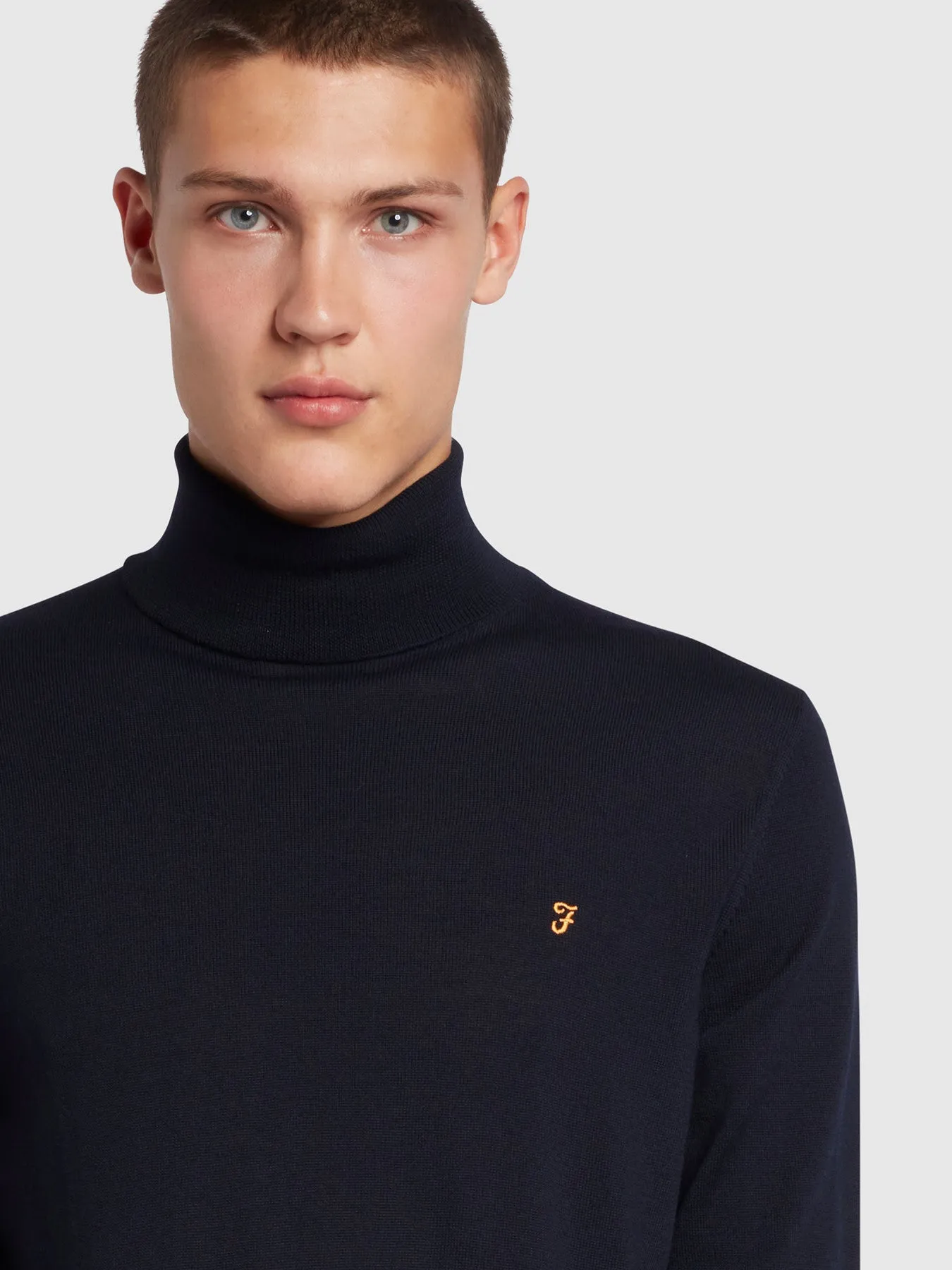 Gosforth Slim Fit Roll Neck Jumper In True Navy